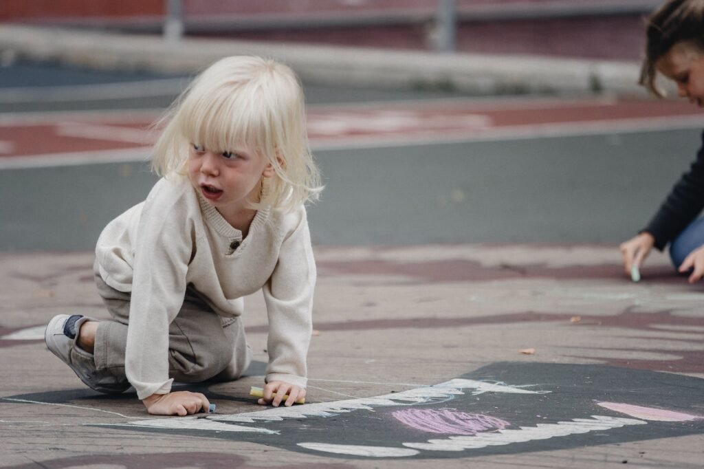 emotional girl on ground looking away